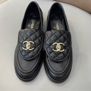 CHANEL Quilted Black Loafers with Gold Logo